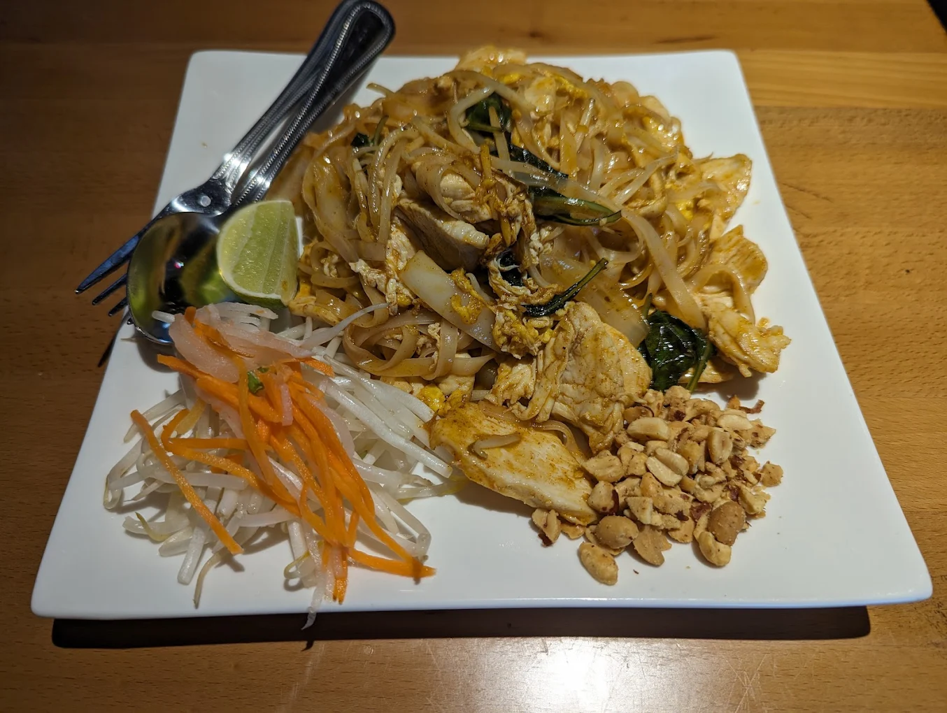 Pad Thai with chicken at Pho Ngon - stir-fried rice noodles with bean sprouts, crushed peanuts and lime